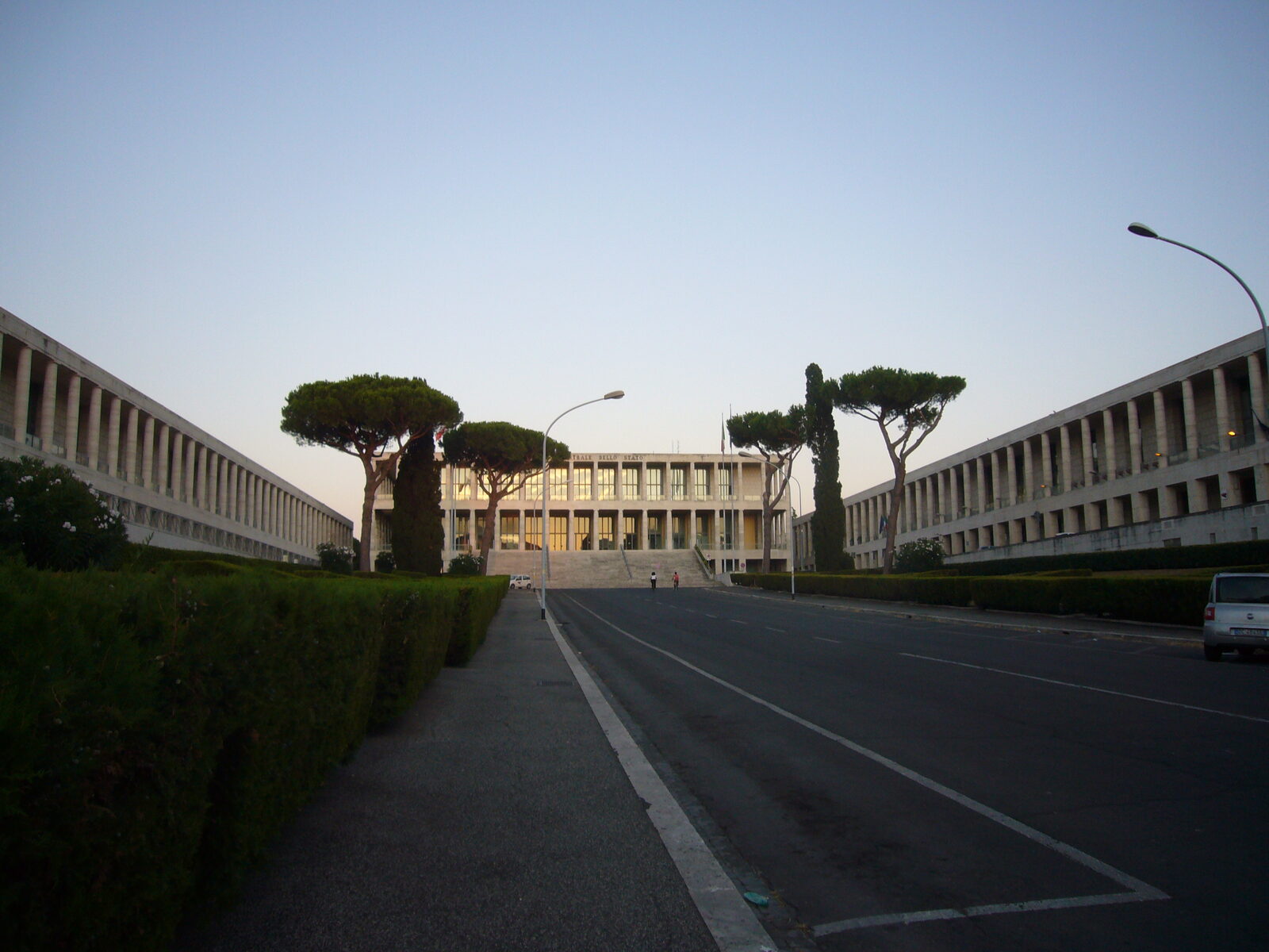 The modernist stone facade and colonnade of the Archivio Centrale dello Stato building in the EUR district of Rome