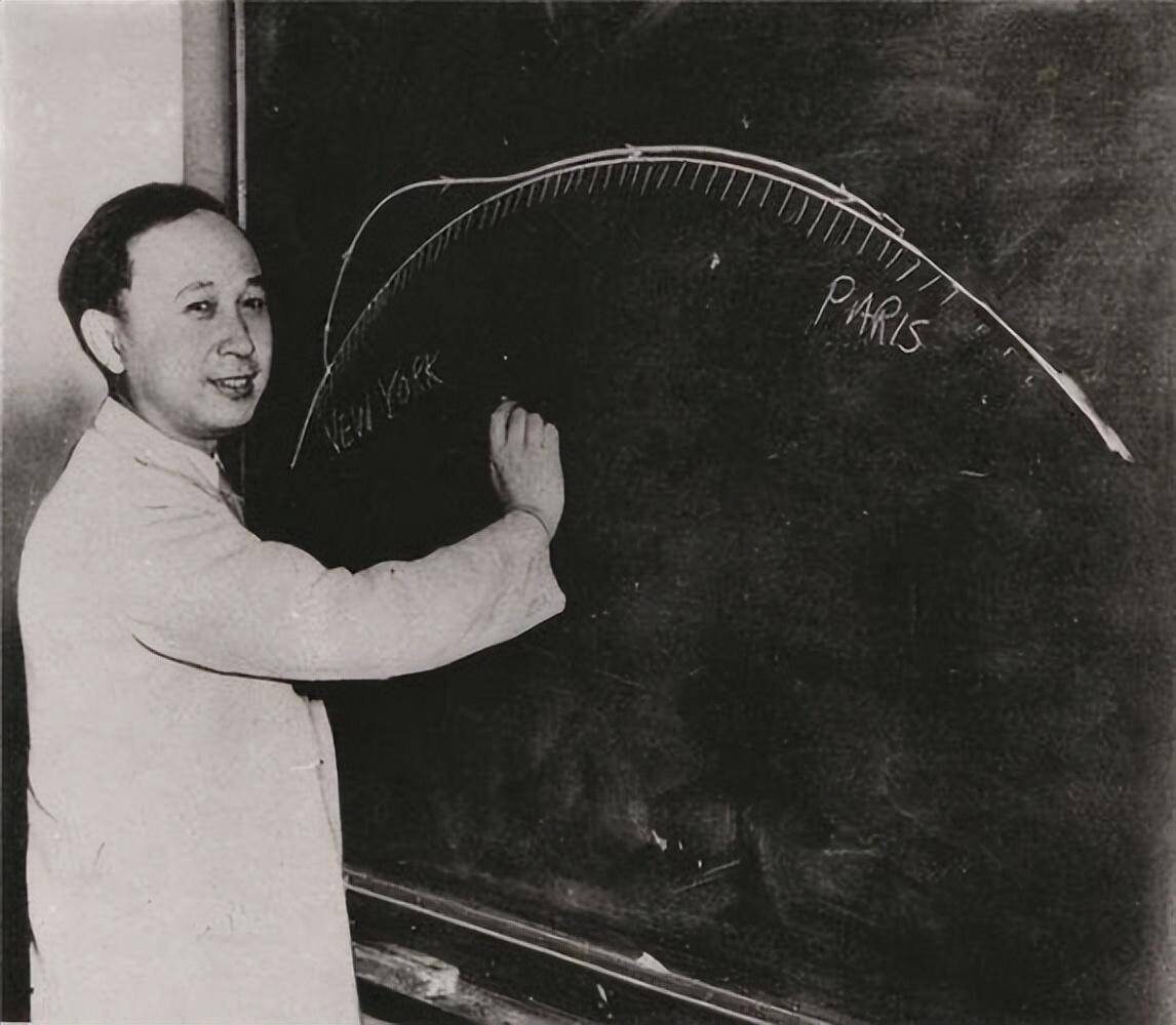 Black-and-white portrait photograph of the young Chinese scientist Qian Xuesen (Tsien Hsue-shen)