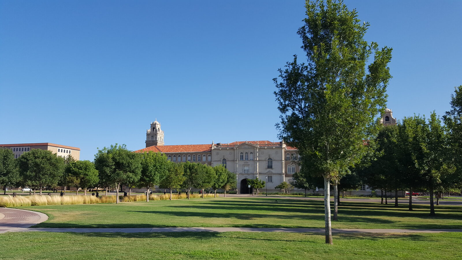 The Spanish Renaissance-style Administration Building at Texas Tech University in Lubbock, Texas, with its bell tower against a clear sky